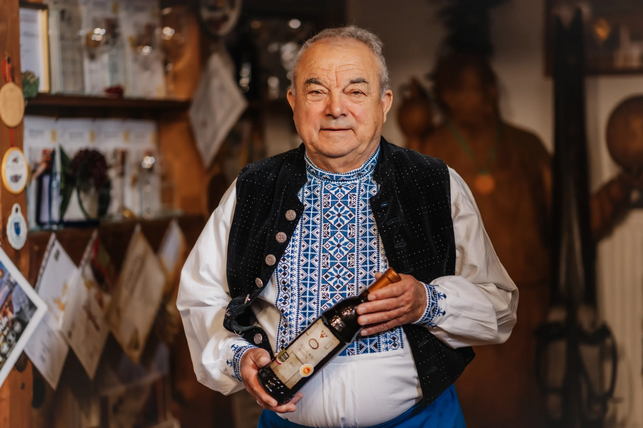 folk_costume_man_wine_bottle